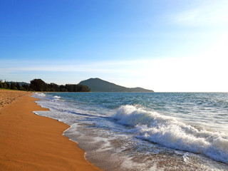 Fototapeta na wymiar Sunny tropical beach with blue sky