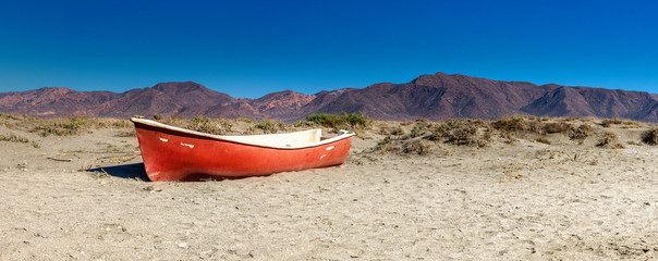 Red boat in desert, Andalusia