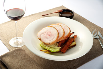 Roasted Pork Dish dinner with wine