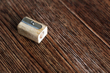 Wooden sharpener, old, school supplies. Close view.