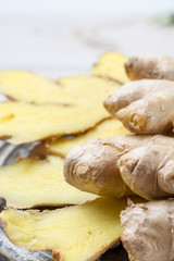 Fresh sliced ginger - ingredient for healthy food