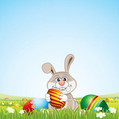 Bunny with Easter Eggs on Scenic Landscape