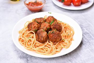 Meatballs in tomato sauce and spaghetti