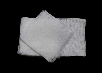 gauze pads on the black background