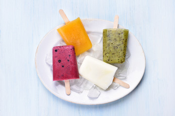 Popsicles from fruits, top view
