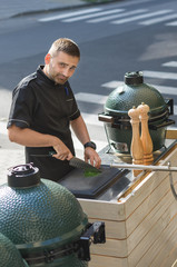 Barbecue chef tasting outdoor kitchens