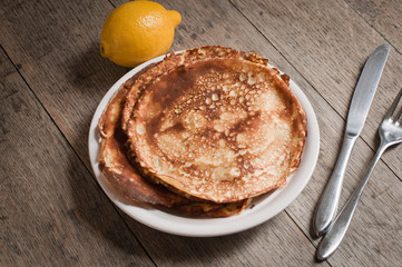 crepes with a sugar and lemon topping