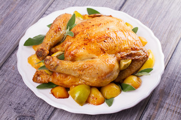 Chicken with Lemon, Lime and Potato Garnished with Sage