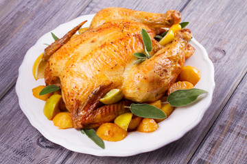 Chicken with Lemon, Lime and Potato Garnished with Sage