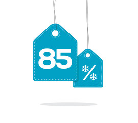 Obraz na płótnie Canvas Blue hanging price tag labels with 85% and snowflake percent design texts on them and with shadow isolated on white background. For winter sale campaigns.