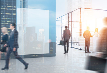 Office with glass walls and poster, people