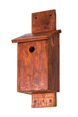 A handmade nest box for small birds isolated on white background side low view
