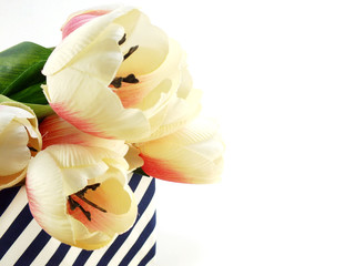 bouquet of  tulip artificial flower on white background space for text