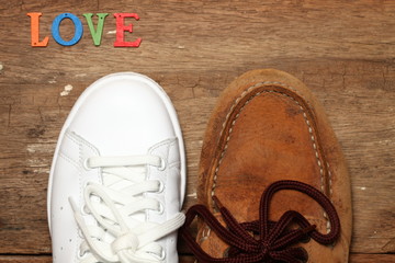 The small size wood cutting in wording put on the shoe surface background.