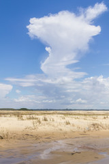 Dunes and beautiful cloud formation in Tavare city