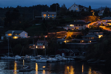 Night view of the houses on the coast