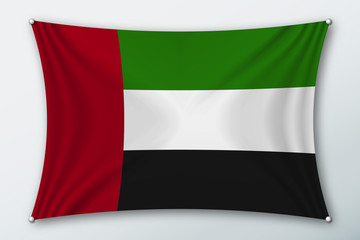 United arab Emirates national flag. Symbol of the country on a stretched fabric with waves attached with pins. Realistic vector illustration.