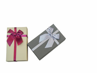 Gift box tied with a ribbon on a white background.