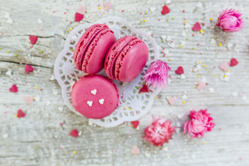 Fototapeta na wymiar French macaroons delicious cookies for Valentine's Day.