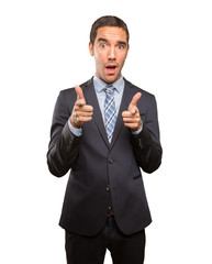 Young businessman pointing with his finger