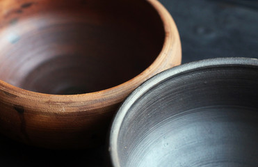 Ceramic bowl on wooden background