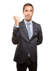 Proud young businessman challenging