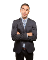 Pensive young businessman  posing