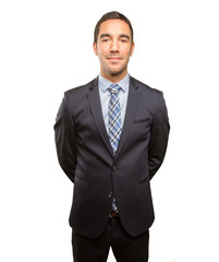 Satisfied young businessman posing