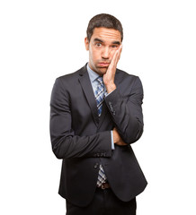 Overworked young businessman