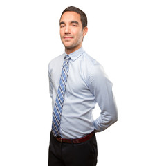 Satisfied young businessman posing