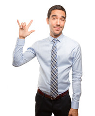 Cool young businessman posing