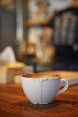 Coffee cup on wooden table
