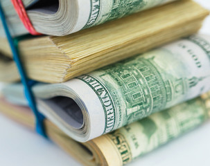 Success and got profit with pile of American dollars