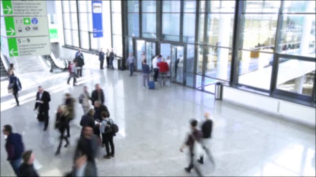 blurred people at a modern hall