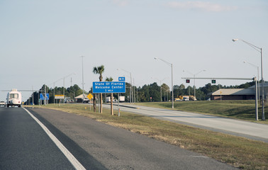 Florida Welcome Center sign on the highway I-10 north of Pensacola Florida USA