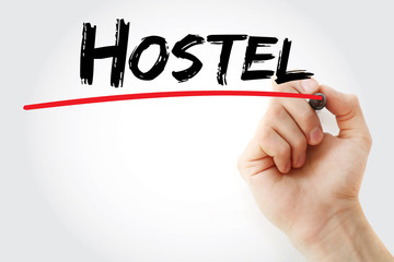 Hand writing hostel with marker, concept background