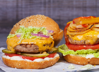 Beef burgers with red, yellow peppers, napa cabbage and cheddar