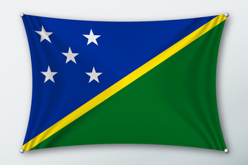 Solomon islands national flag. Symbol of the country on a stretched fabric with waves attached with pins. Realistic vector illustration.