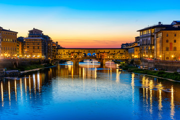 Sunset view of Ponte Vecchio over Arno River in Florence, Italy