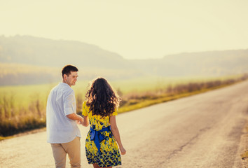 Brides running along the road