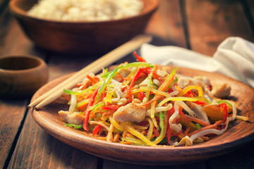 Stir fry chicken meat with vegetables and sprouts 