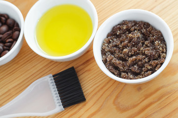 Homemade sugar, olive oil and ground coffee face and body scrub. DIY cosmetics
