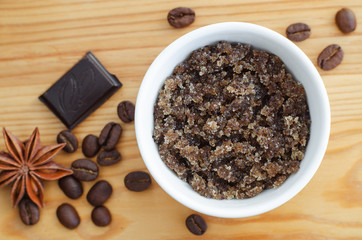 Homemade sugar, olive oil and ground coffee face and body scrub. DIY cosmetics