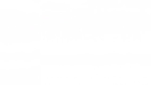 Man having fun and sliding down in a water slide