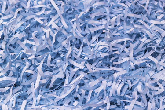 Blue paper strips from a shredder