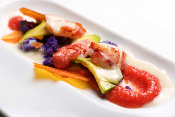 Lobster with sauce and vegetables