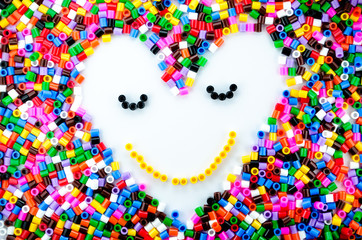 Full Color Beads On White Background, Close Up.
