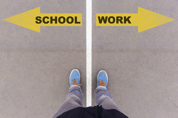 School vs Work text arrows on asphalt ground, feet and shoes on