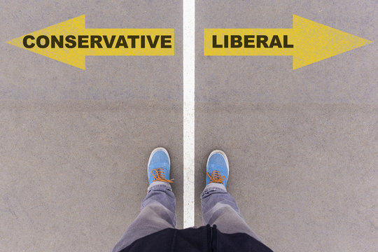 Conservative Vs Liberal Text Arrows On Asphalt Ground, Feet And