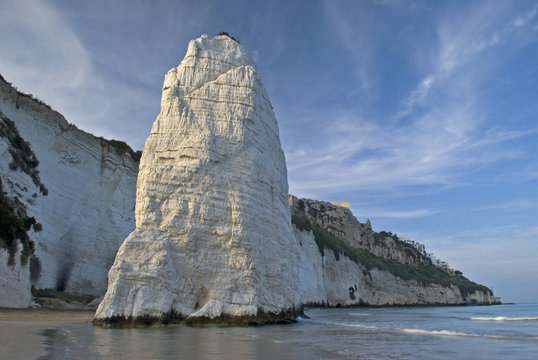 Pizzomuno stack and limestone cliffs, Vieste, Gargano National Park, Gargano Peninsula, Apulia, Italy, May 2008
